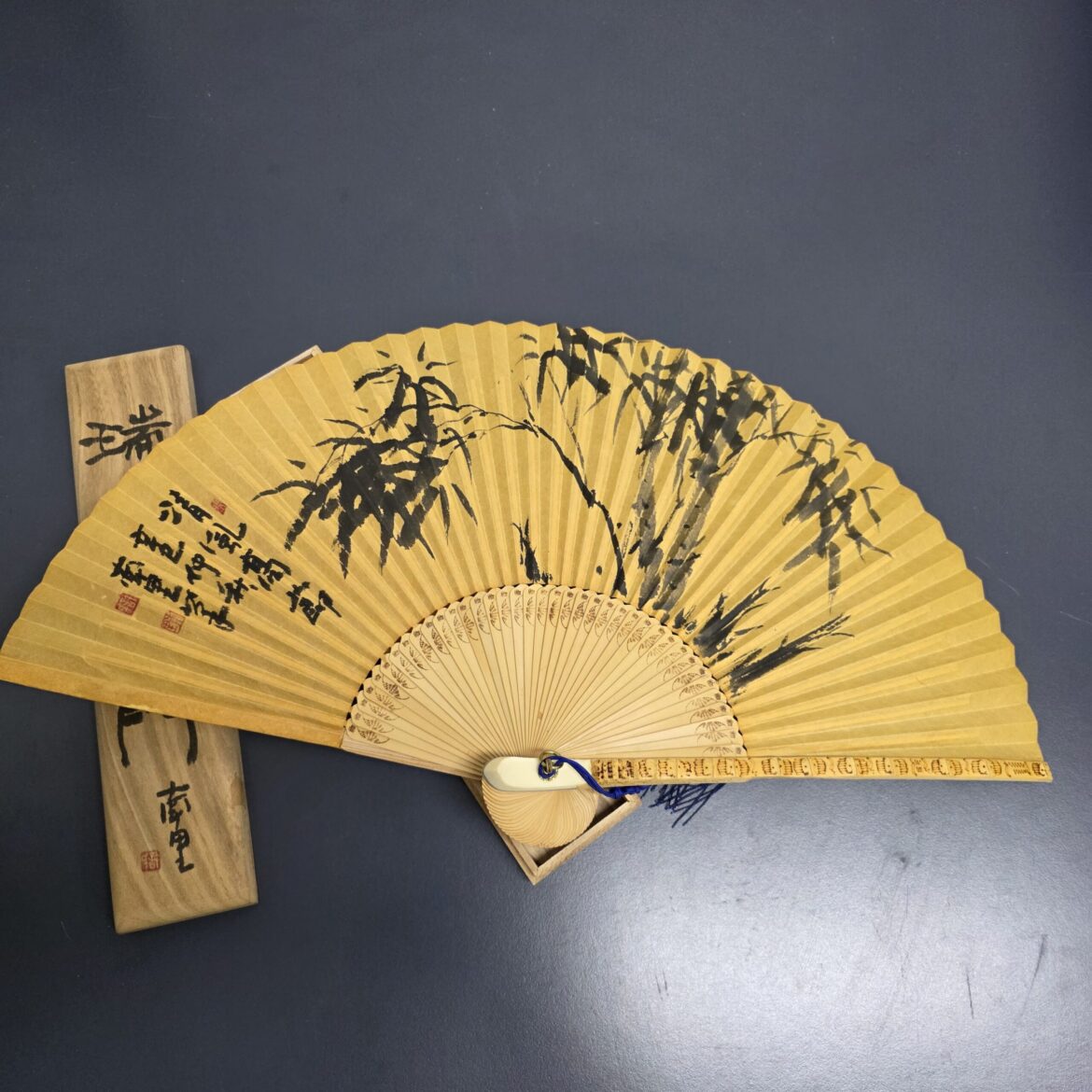 Fully opened traditional Korean Jeolla-do Hapjukseon fan with bamboo ink painting and calligraphy