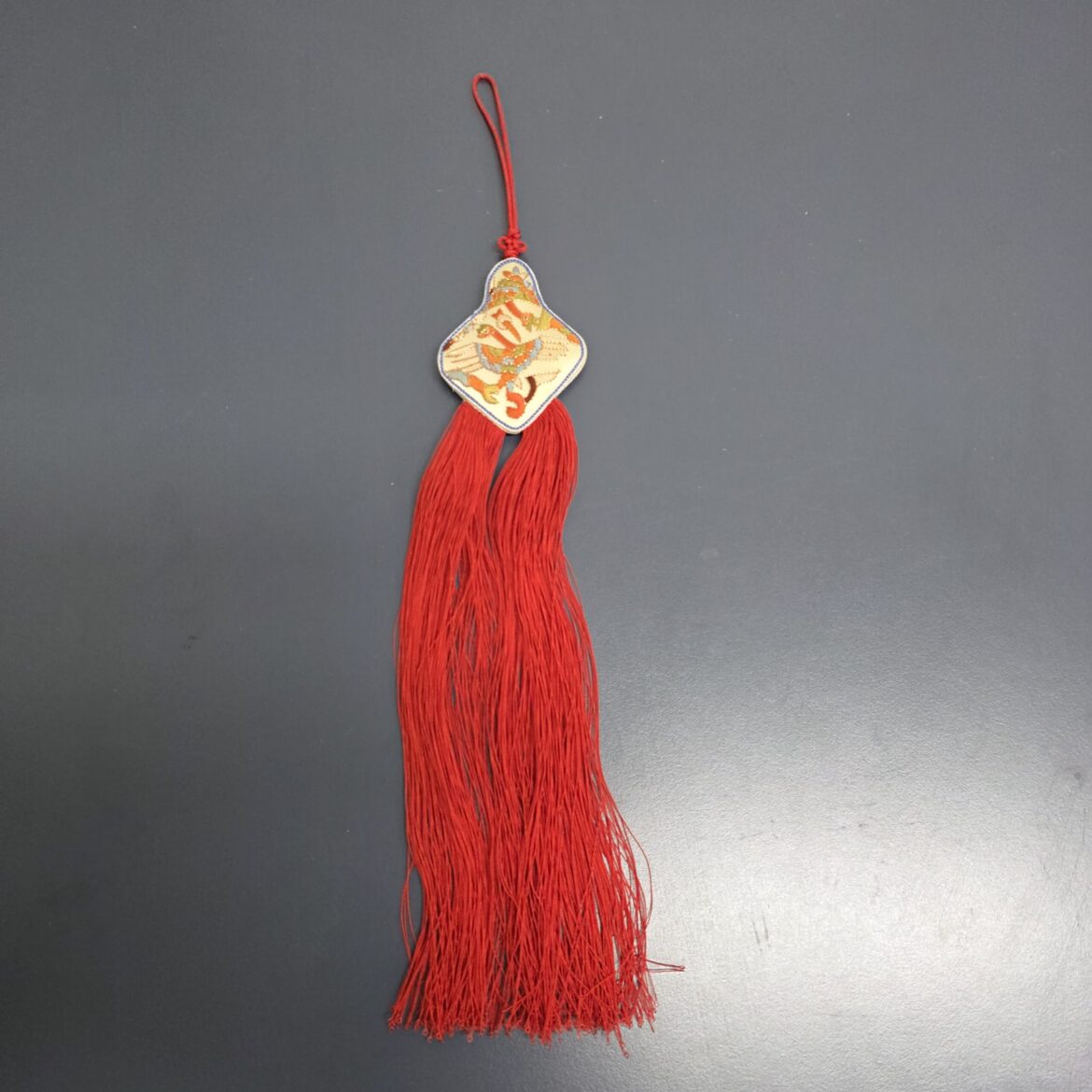 Vintage Korean embroidered norigae with crane motif and long red tassels